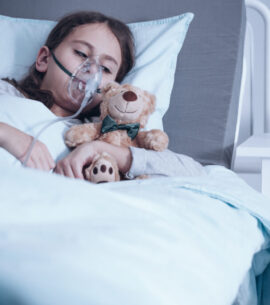 Kid with oxygen mask