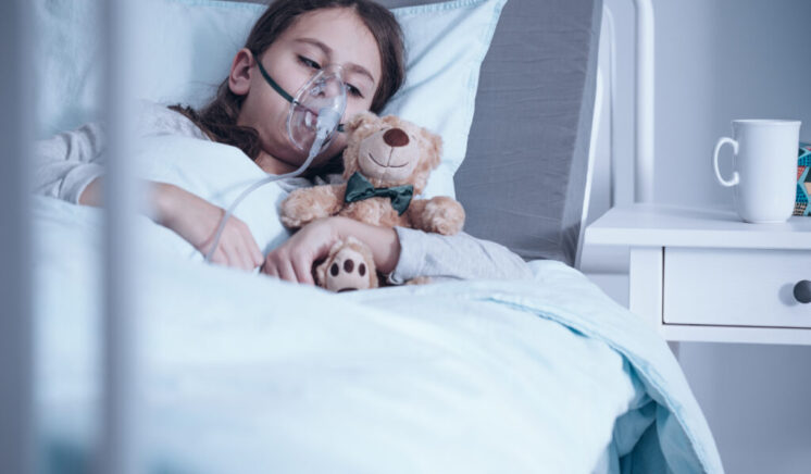 Kid with oxygen mask